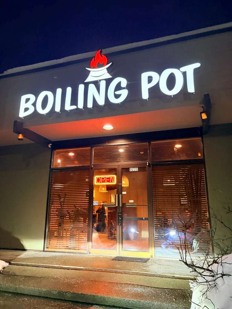 Boiling Pot storefront at night